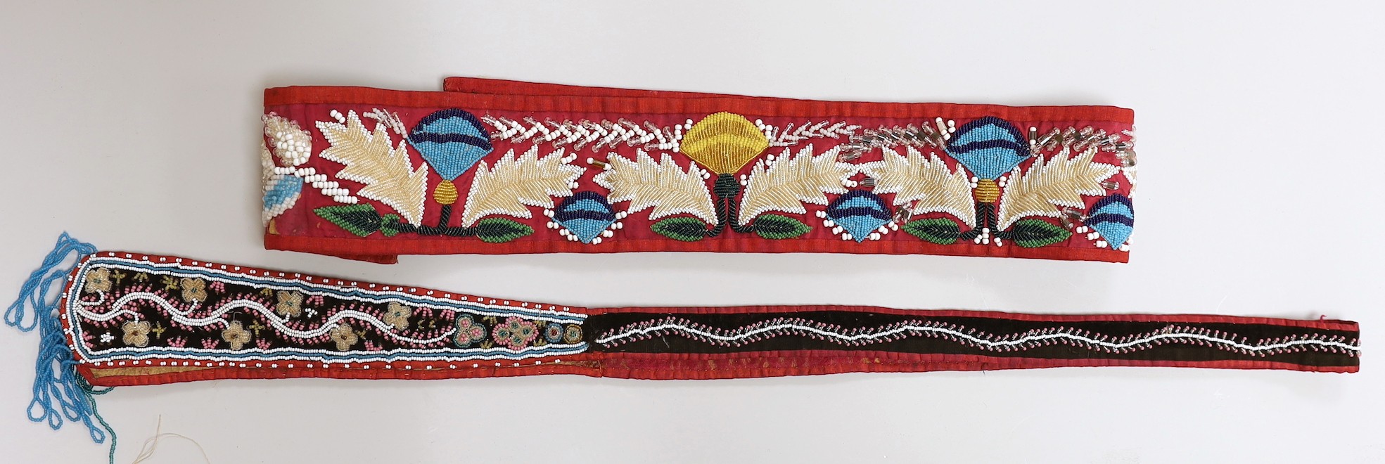 A 19th century North American bead worked tie and wider bead worked panel, possibly made as a belt, (2)